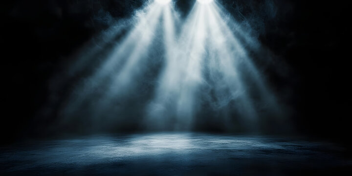 暗い空間に広がる霧とスポットライトの光