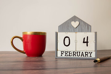 Day 4 of february month, Wooden calendar with date. Empty space for text.