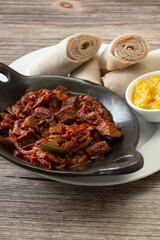 A view of a bowl of awaze tibs.