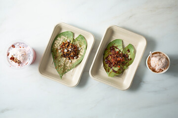 A top down view of assorted Indian desserts.