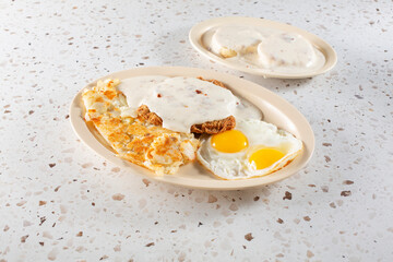 A view of a country-fried steak entree.
