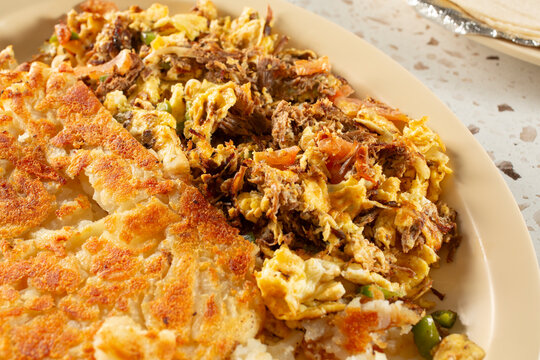 A closeup view of a machaca breakfast entree.