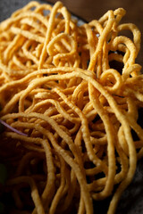 A closeup view of crispy fried noodles.