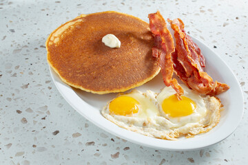 A view of a pancake breakfast plate.