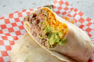 A closeup view of a carne asada burrito.