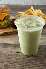 A view of an iced matcha latte.