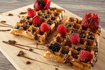 A closeup view of a chocolate hazelnut drizzle waffles.