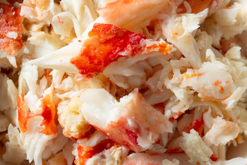 A top down view of a pile of king crab leg meat, as a background. © DAVID