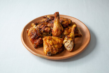 A view of a plate of pollo asado.