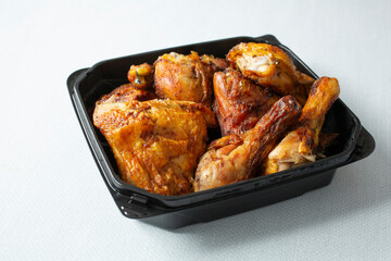 A view of a container of pollo asado.