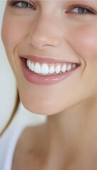 A woman with a bright smile and white teeth