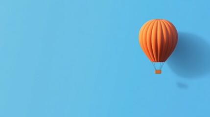 Fototapeta premium Orange hot air balloon floats on a clear blue sky. Minimalist travel concept.