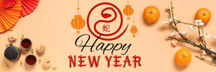 Teapot with cups of tea, fortune cookies and Chinese symbols on beige background. New Year celebration