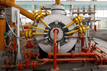 Powerful industrial pump operating within a chemical plant's facility during daylight hours showcasing advanced engineering and design