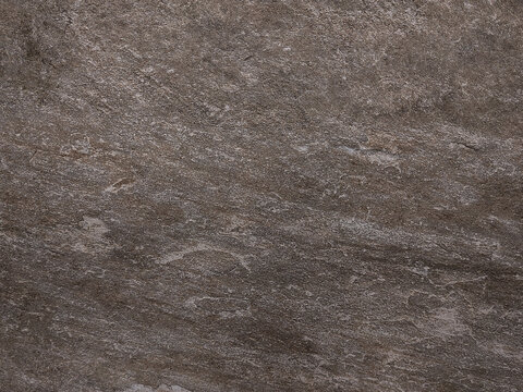 Fundo de textura de pedra &aacute;spera. Superf&iacute;cie de textura de piso azulejo porcelanato acetinado. Textura de piso cimento queimado escuro para fundos, designs e materiais 3D