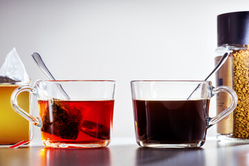 Hot coffee and tea on the table.