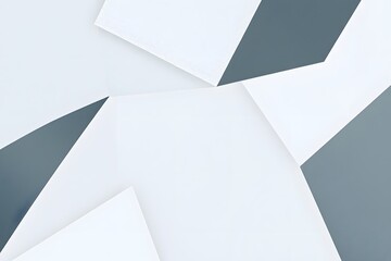 Abstract composition of overlapping white and gray geometric shapes creating a minimalist design.