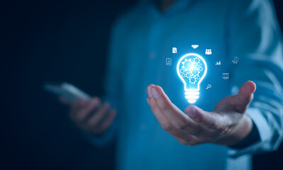 Business solution idea concept. Businessman  creative light bulbs with marketing network, planning...
