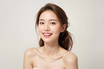 A woman with a beautiful smile and long brown hair