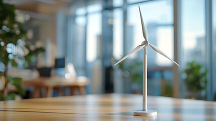 Small white windmill model on business office table, copy space. sustainable renewable energy power technology, clean alternative electricity turbine, environment, ecology, future.