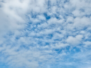 Textured Cloud Blanket in a Crystal Blue Sky - Atmospheric Elegance in Dong Hoi, Quang Binh, Vietnam
