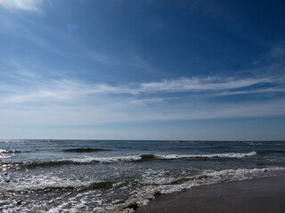 Nature’s Harmony: Gentle Waves Caressing a Quiet Shoreline in Dong Hoi, Quang Binh, Vietnam
