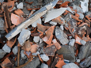 fragments of roof tiles and small rocks