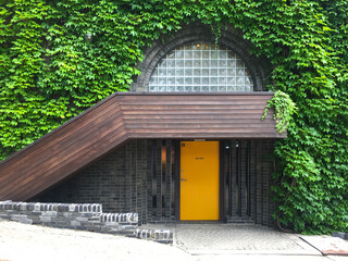 Architectural elements connecting exterior and interior spaces, showcasing various door designs.