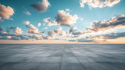 a large empty concrete floor with a sky background