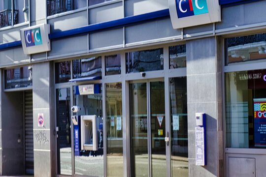 annecy, france - 06 September 2022: the sign of a french bank, CIC bank, is hanging above an historic city office