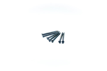 Photo of a bunch of special nails for concrete. Made of metal that is strong enough to penetrate the hardness of concrete.