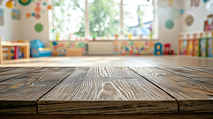 A wooden desk is set against a blurred backdrop of a child's room or kindergarten interior in a...