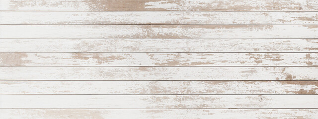 Whitewashed wood planks feature distressed paint revealing beige wood.
