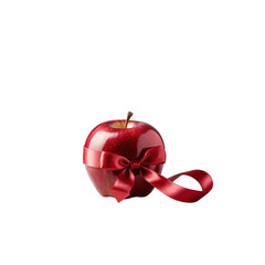 Elegant red apple wrapped in satin ribbon as a luxurious and refined gift decoration