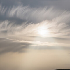 Mystical sun rays from a cloudy morning sky