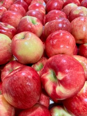 Closeup on red and yellow honeycrisp apples at grocery store
