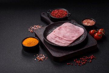 Boiled ham with salt and spices cut into slices