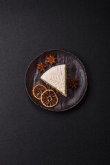 Piece of cheesecake with nuts and berries with winter pattern