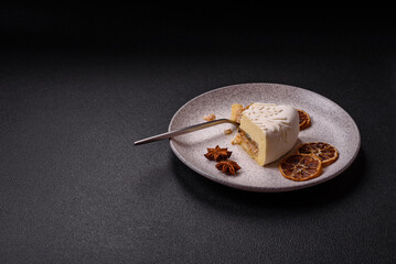 Piece of cheesecake with nuts and berries with winter pattern