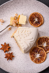 Piece of cheesecake with nuts and berries with winter pattern