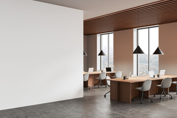 Empty white wall mockup inside a modern office space with natural light and wooden furniture. 3D Rendering