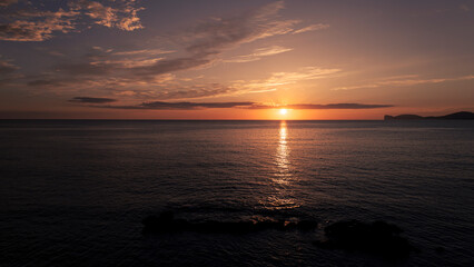 Sunset in the sea in orange tones, Sardinia