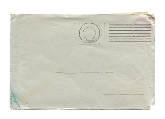 front view of old closed aged paper envelope with wrinkles and torn edges isolated on white