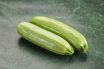 Raw green ripe zucchini vegetable