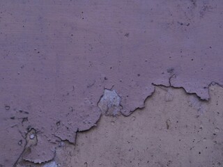 Wall cracks create a vintage aesthetic, indicating necessary renovation to address potential...
