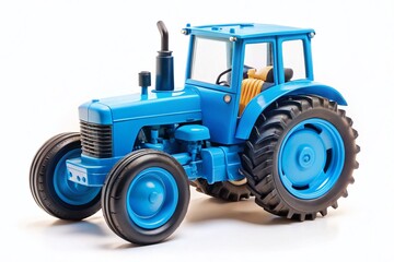 Obraz premium Blue Toy Tractor Isolated on White Background - Stock Photo