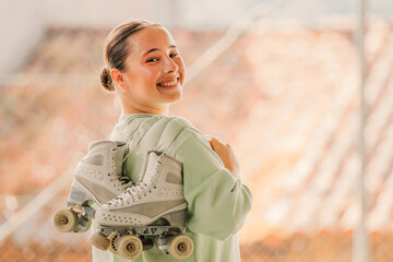figure skating athlete with skates smiling outdoors