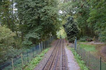Nerobergbahn funicular Wiesbaden, a small train going up to the Neroberg with the Russian Orthodox Church of Wiesbaden, Germany
