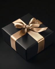 Elegant black gift box with a luxurious gold ribbon and bow, perfect for special occasions.