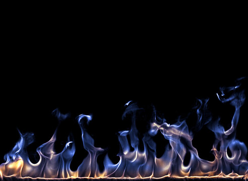 blue gas burning on black background
